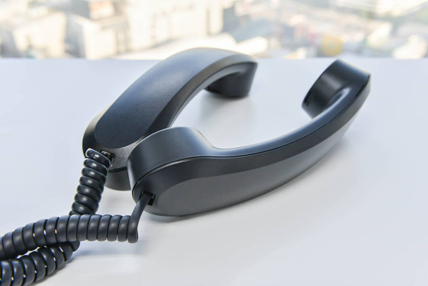 Phone handset line spiral - Conference call concept - Photo, Image