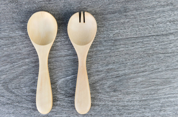 Wooden fork and spoon on the wooden table - Photo, Image