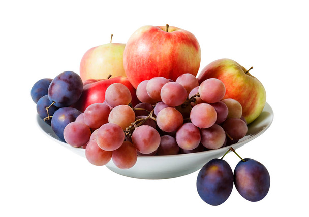 Bowl with fruits isolated on white background - Photo, image