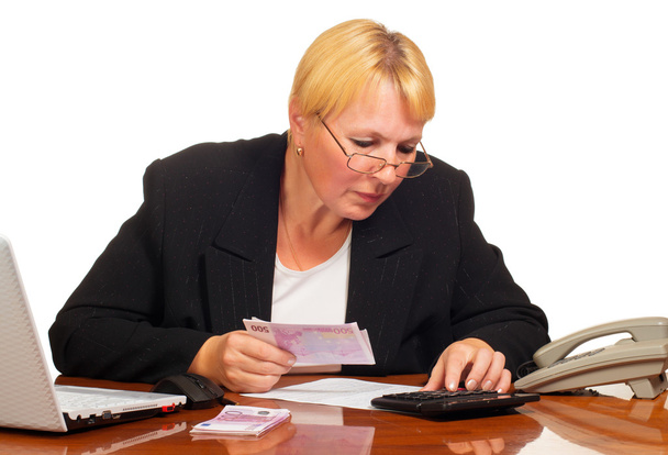 Mature businesswoman counting the money. - Foto, Imagem