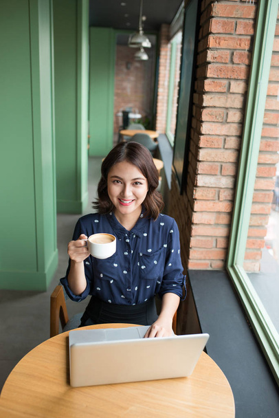 Cute asian young businesswoman in the cafe - Photo, Image