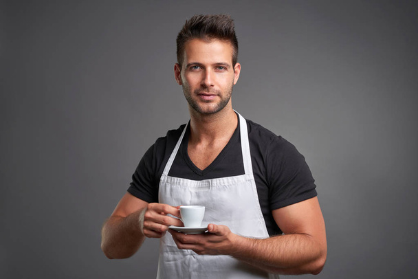A young barista man - Foto, afbeelding