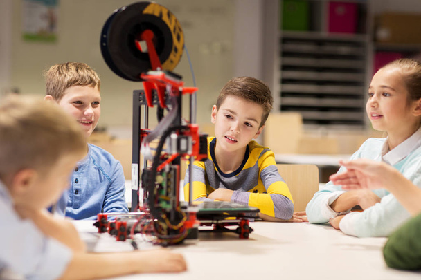 happy children with 3d printer at robotics school - Фото, изображение