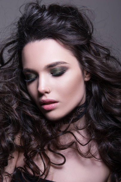 Close-up portrait of beautiful sensual woman with bright makeup and perfect hairstyle. - Valokuva, kuva