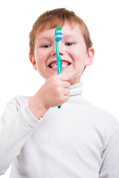 little boy holding toothbrush - Foto, imagen