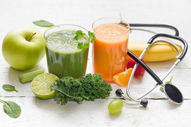 Fruits, vegetables, juice, smoothie and stethoscope health diet and fitness lifestyle concept - Valokuva, kuva