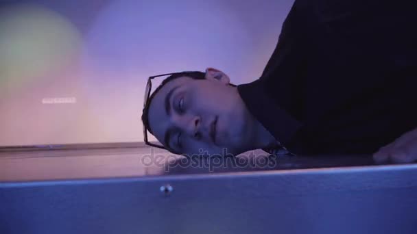 Seizures guy at party, falling on the floor - Felvétel, videó