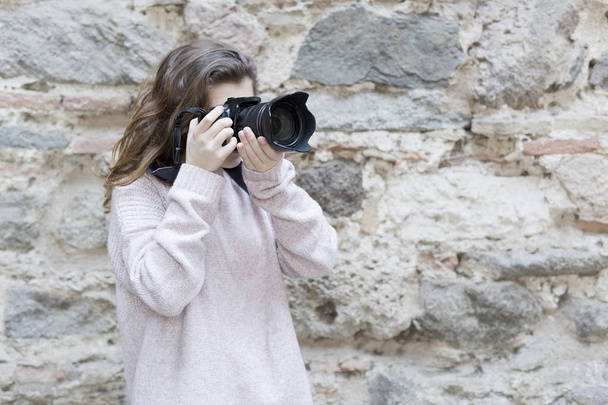 Young woman taking photos  - Photo, Image