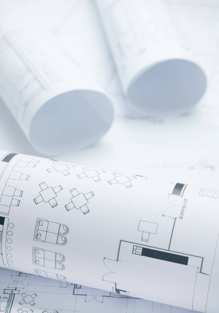 architectural drawing paper rolls of a dwelling for construction - Photo, image