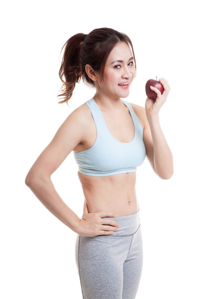 Beautiful Asian healthy girl with apple. - 写真・画像