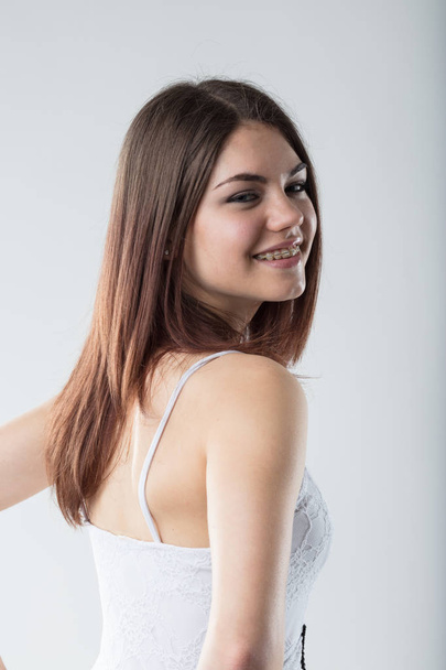 smiling young woman with a retainer - Fotografie, Obrázek