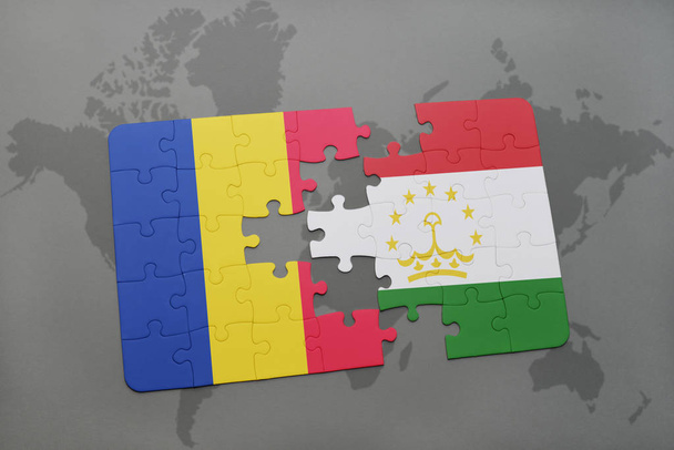 παζλ με την εθνική σημαία της Ρουμανίας και του Τατζικιστάν σε έναν παγκόσμιο χάρτη - Φωτογραφία, εικόνα