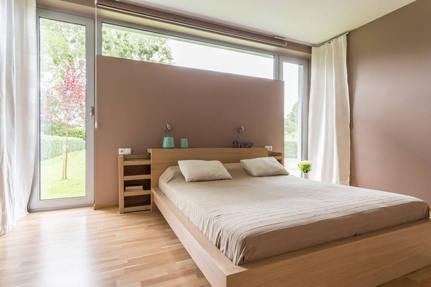 Nude bright bedroom interior - Фото, изображение