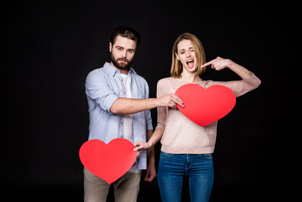 Couple with paper hearts - Φωτογραφία, εικόνα