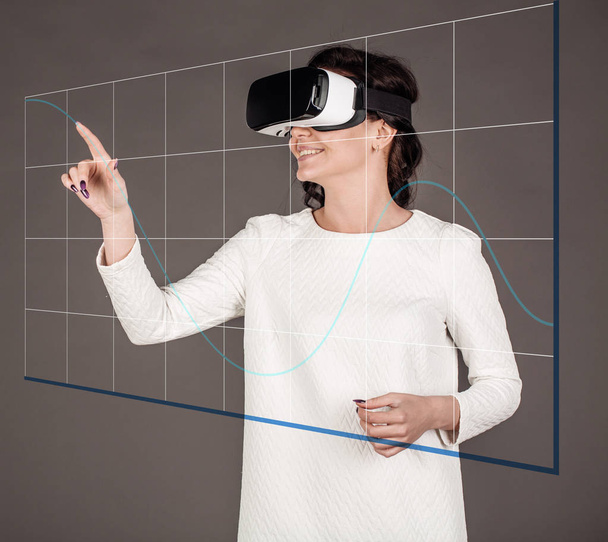female with glasses of virtual reality. VR headset glasses device. - Valokuva, kuva