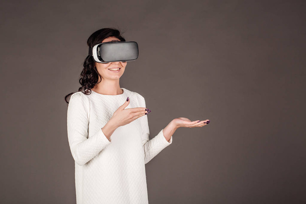 female with glasses of virtual reality. VR headset glasses devic - Photo, Image