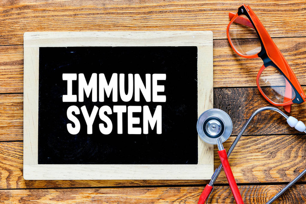 Lavagna con sistema immunitario con iscrizione
 - Foto, immagini