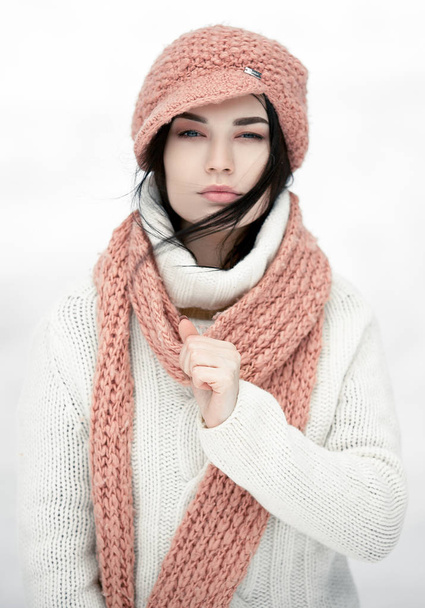 Portrait of girl in sweater, hat and scarf. - Zdjęcie, obraz