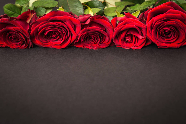 beautiful red roses on black background - Valokuva, kuva