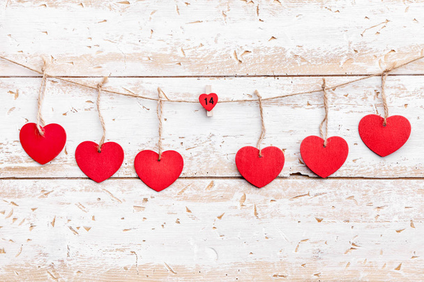 Love concept. Hearts hanging on a string - Zdjęcie, obraz