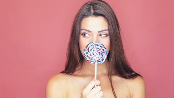 Beautiful woman with lollipop - Footage, Video