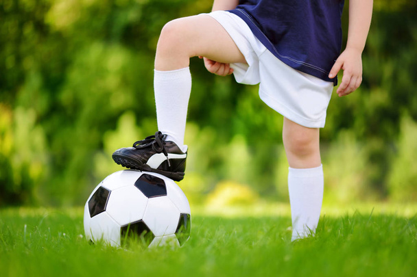 child having fun playing a soccer game - Zdjęcie, obraz
