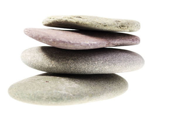 Pebble from beach against a white background - Photo, Image
