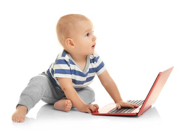 Cute baby boy with laptop - Foto, imagen