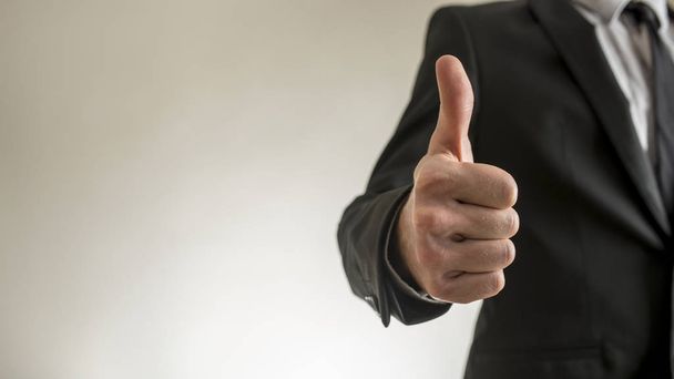 Businessman thumbs up with copy space - Foto, Imagen