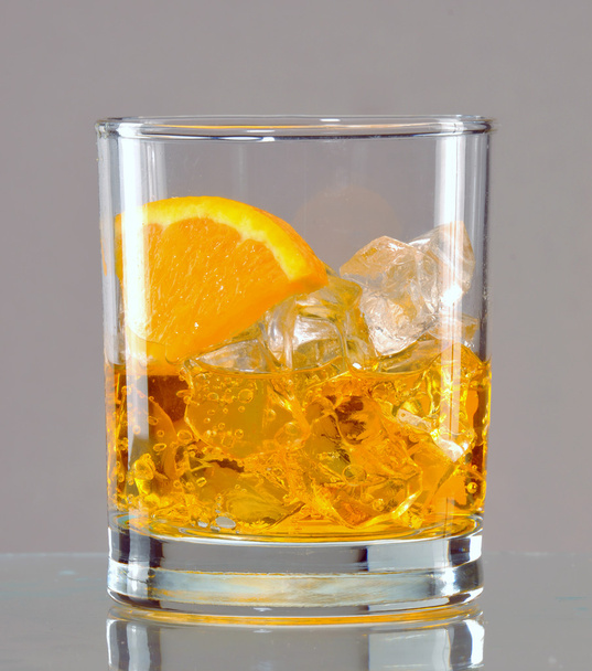 Exotic orange drink in glass - Foto, afbeelding