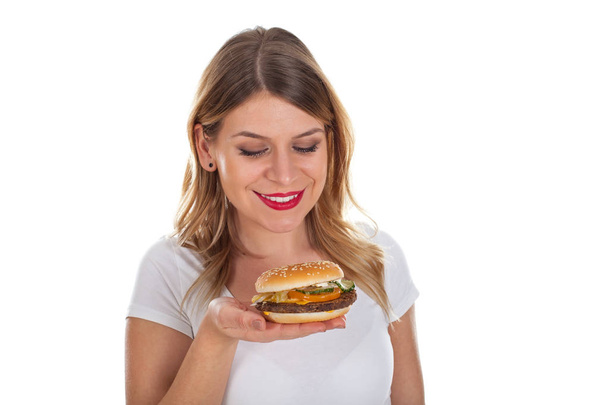 Beautiful young woman with hamburger - Φωτογραφία, εικόνα