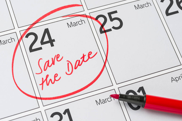 Save the Date written on a calendar - March 24 - Photo, Image