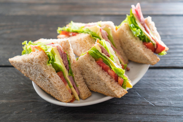 sandwich  on wood background - Foto, afbeelding