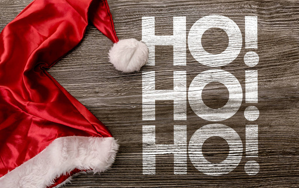 Santa şapka işareti ile ho ho ho - Fotoğraf, Görsel
