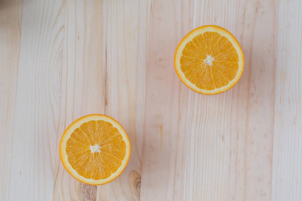 Fresh orange on wooden decks. - Zdjęcie, obraz