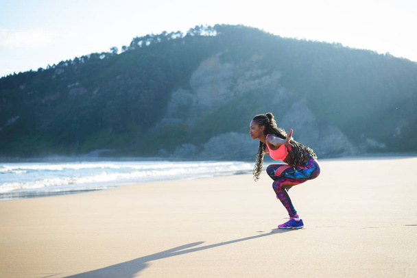 Woman practicing balance yoga exercise  - Foto, afbeelding