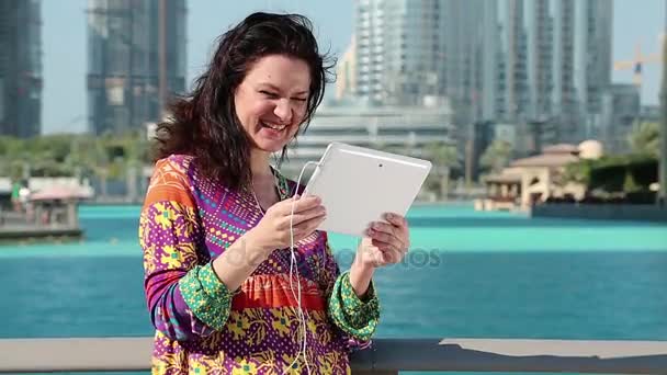 Woman communicates via tablet - Footage, Video
