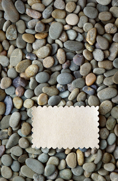 паперова тарілка на фоні морської гальки
 - Фото, зображення