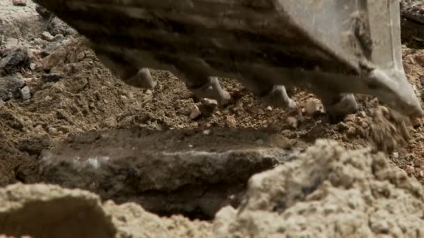 primer plano de la excavadora durante la excavación
 - Metraje, vídeo