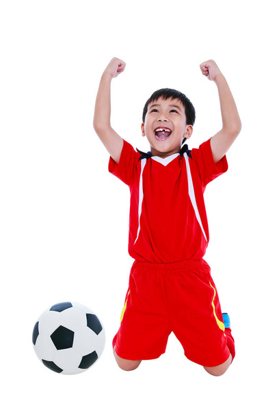 Asian soccer player showing arm up gesture. Action of winner or successful people concept - Photo, Image