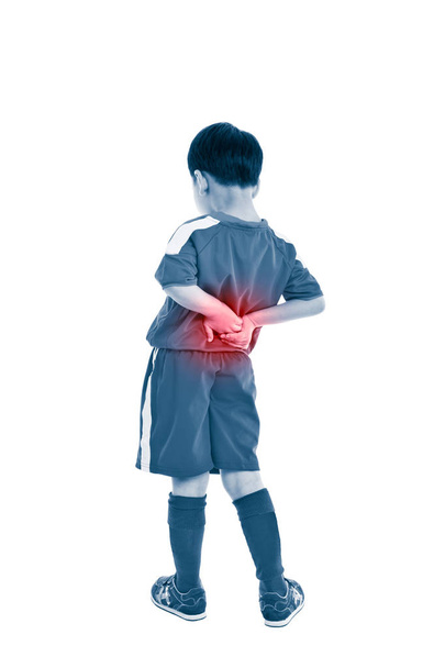 Back pain. Child rubbing the muscles of his lower back. Isolated on white background.  - Photo, Image