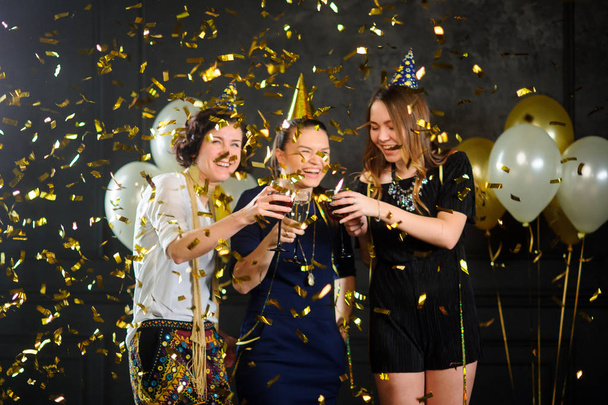 Three young women celebrate something. - Photo, Image