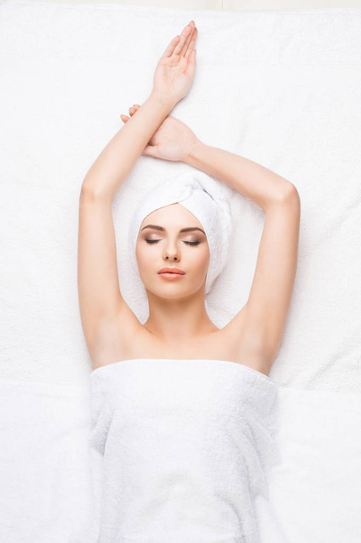 young woman wrapped in towel - Photo, Image