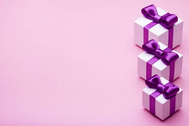 Gifts with purple ribbons - Photo, Image