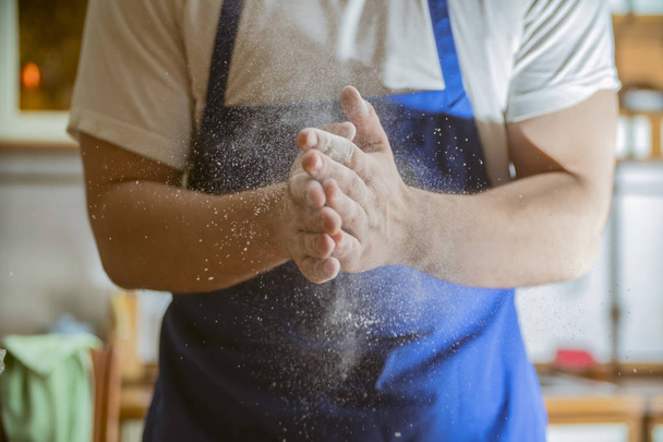 hands chef in the flour shake - Fotó, kép