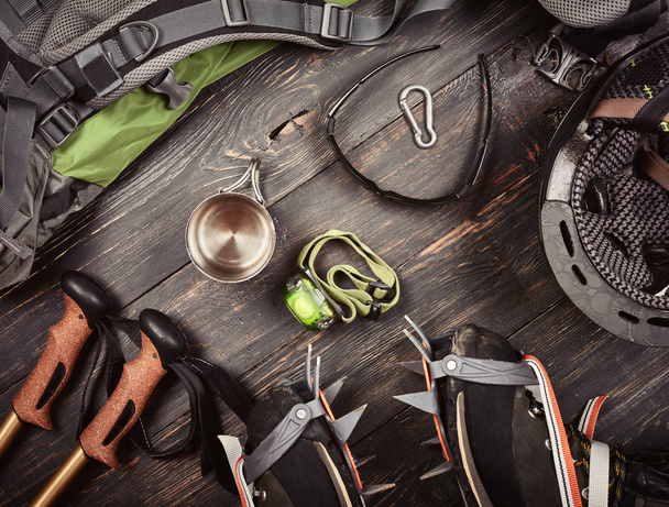 Climber accessories set on dark wooden background - Valokuva, kuva