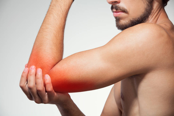 Elbow pain symbol - Φωτογραφία, εικόνα