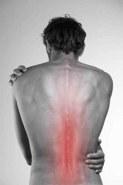 Schmerzen im unteren Rückenbereich - Foto, Bild