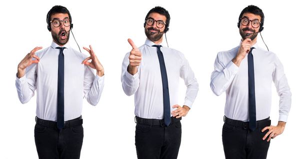 Handsome telemarketer man with thumb up - Photo, Image