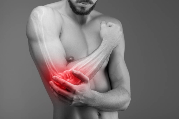 Símbolo de dolor de brazo
 - Foto, Imagen
